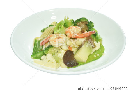 stir fried slice cauliflower and mixed vegetable with shrimp on plate 108644931