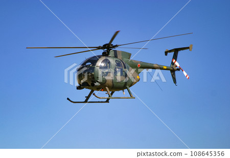 Small Helicopter OH-6D of the Ground Self-Defense Force in flight Small Helicopter OH-6D of the Ground Self-Defense Force in flight 108645356