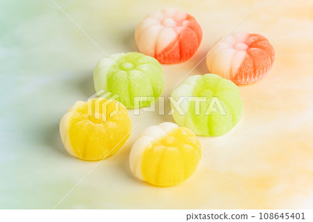 Gummies placed on a colorful background board. Gummies placed on a colorful background board. 108645401