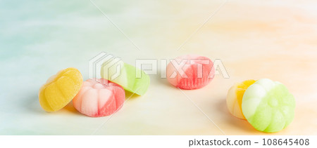 Gummies placed on a colorful background board. Gummies placed on a colorful background board. 108645408
