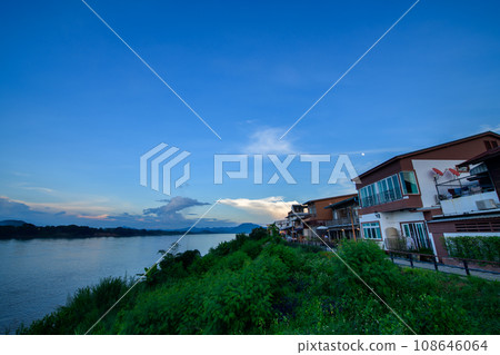 Landscape of classic wooden house beside the Mekong river in Chiang Khan district, Loei. Travel concept Landscape of classic wooden house beside the Mekong river in Chiang Khan district, Loei. Travel concept 108646064