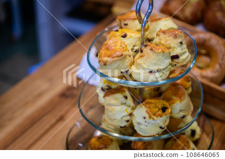 Traditional british scones with  strawberry jam for tea time in cafe. t 108646065