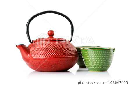 Iron teapot and cups 108647463