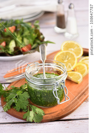 Green sauce, seasoning for salad 108647787