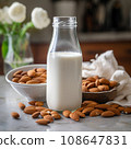 Almond milk in bottle with nuts. Non Dairy milk substitute drink, healthy eating. 108647831