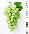 Sweet Green grape with leaves, isolated on a white background. 108647854