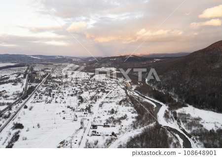 Aerial view of winter mountains. Aerial view of winter mountains. 108648901