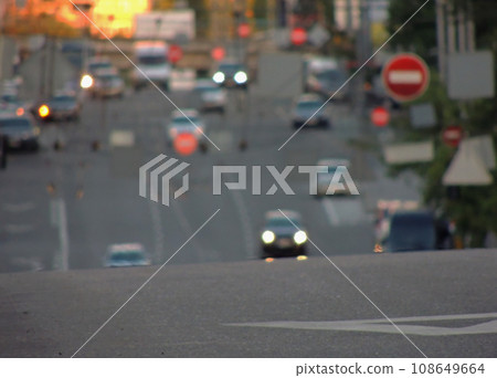 Road Traffic On City Street With Soft Focus Road Traffic On City Street With Soft Focus 108649664