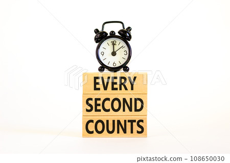 Every second counts symbol. Concept words Every second counts on wooden blocks on a beautiful white table white background. Black alarm clock. Business, motivational and every second counts concept. Every second counts symbol. Concept words Every second counts on wooden blocks on a beautiful white table white background. Black alarm clock. Business, motivational and every second counts concept. 108650030