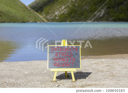 Integrity ethics honesty respect symbol. Concept word Integrity Ethics Honesty Respect on beautiful blackboard. Beautiful mountain lake background. Business integrity ethics honesty respect concept. Integrity ethics honesty respect symbol. Concept word Integrity Ethics Honesty Respect on beautiful blackboard. Beautiful mountain lake background. Business integrity ethics honesty respect concept. 108650165