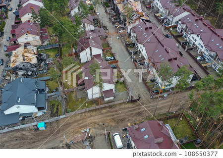 Hostomel, Kyev region Ukraine - 09.04.2022: Top view of the destroyed and burnt houses. Houses were destroyed by rockets or mines from Russian soldiers. Cities of Ukraine after the Russian occupation. Hostomel, Kyev region Ukraine - 09.04.2022: Top view of the destroyed and burnt houses. Houses were destroyed by rockets or mines from Russian soldiers. Cities of Ukraine after the Russian occupation. 108650377