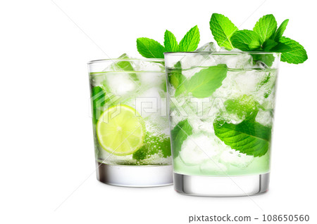 Set of Mojito cocktails, garnished with fresh mint and a slice of lime in a tall glass Set of Mojito cocktails, garnished with fresh mint and a slice of lime in a tall glass 108650560