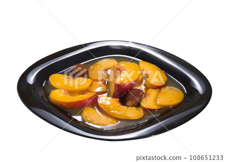 Juicy peaches in own juice. On are isolated a white background Juicy peaches in own juice. On are isolated a white background 108651233