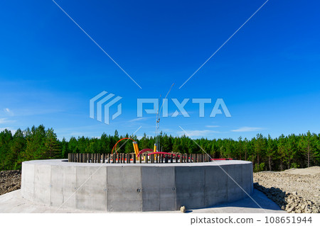 Concrete Foundation for Electric Wind Turbine: Low Emission Goals, Eco-Friendly, Energy of Nature 108651944