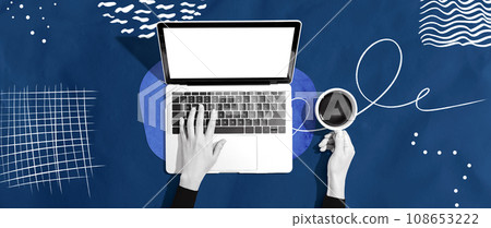 Person using a laptop computer 108653222