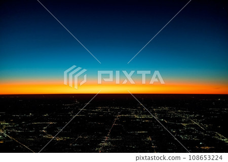 Dramatic sunset over the horizon with Tokyo in the foreground Dramatic sunset over the horizon with Tokyo in the foreground 108653224