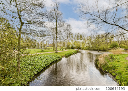 the river in the park, with trees and grass on either side stock photo - 1239876 the river in the park, with trees and grass on either side stock photo - 1239876 108654193