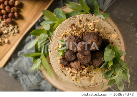 Delicious naked coffee and hazelnuts cake Delicious naked coffee and hazelnuts cake 108654378