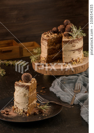 Slice of delicious naked coffee and hazelnuts cake Slice of delicious naked coffee and hazelnuts cake 108654385