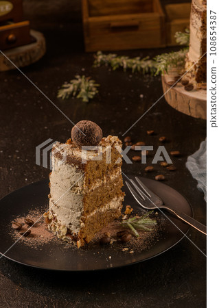 Slice of delicious naked coffee and hazelnuts cake Slice of delicious naked coffee and hazelnuts cake 108654387