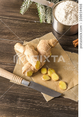 Ginger root and sliced Ginger root and sliced 108654408