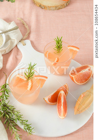 Grapefruit juice with rosemary Grapefruit juice with rosemary 108654434
