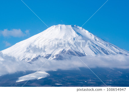 Clear skies at the summit of Mt. Fuji with white snow on the summit 108654947