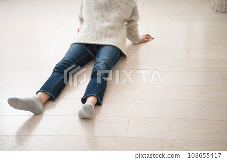 Young woman wearing knitwear lifestyle image 108655417