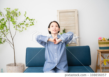Young woman in pajamas lifestyle image 108656057