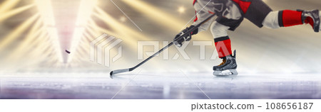 Hockey player in action close-up. Hockey player in beautiful ice rink. Hockey concept. Hockey training. Ice Hockey player in action close-up. Hockey player in beautiful ice rink. Hockey concept. Hockey training. Ice 108656187
