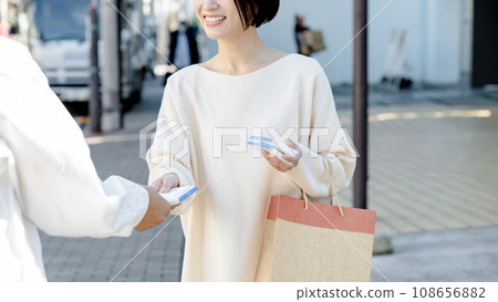 Woman sampling Woman sampling 108656882