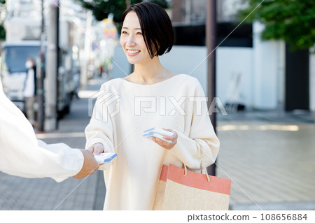 Woman sampling 108656884