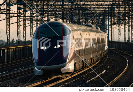 Yamagata Shinkansen E3 series passing at high speed Yamagata Shinkansen E3 series passing at high speed 108658404