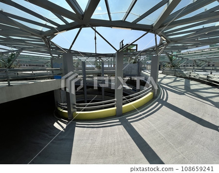 The spiral-shaped architecture at the top of the castle bus stop features a Wako shadow structure. The spiral-shaped architecture at the top of the castle bus stop features a Wako shadow structure. 108659241