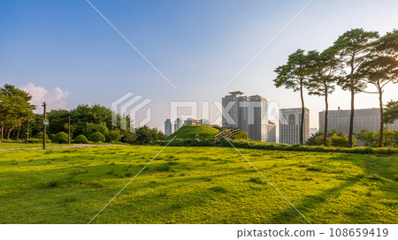 Sunset over the Namsan Park viewpoint with modern skyscrapers in Seoul, South Korea 108659419