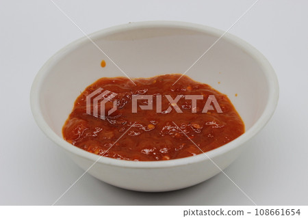 A picture of tomato sauce in bowl A picture of tomato sauce in bowl 108661654