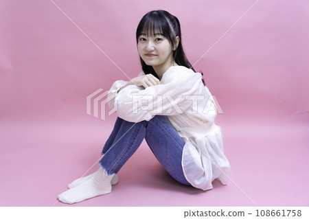 Neat and feminine woman 108661758