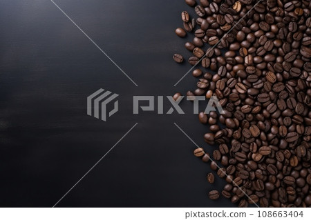 Coffee beans on a dark table with copy space Coffee beans on a dark table with copy space 108663404