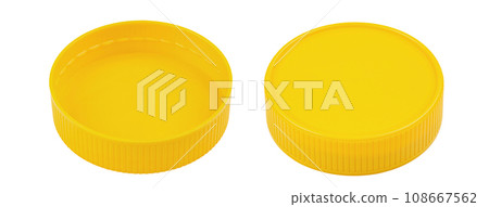 Yellow plastic lid isolated on white background. Plastic round jar lid. Yellow plastic lid isolated on white background. Plastic round jar lid. 108667562