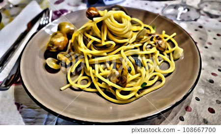 A plate of spaghetti with Mediterranean clams. 108667700