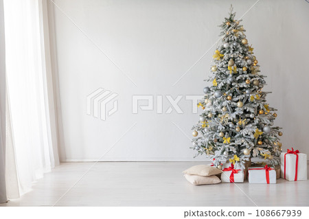 christmas tree with gifts white room new year christmas tree with gifts white room new year 108667939