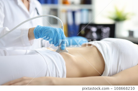 Ultrasound of woman in early pregnancy in clinic 108668210