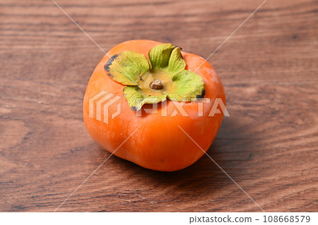 Autumn fruits "persimmons, oysters, persimmons". Orange, persimmon color. Autumn fruits "persimmons, oysters, persimmons". Orange, persimmon color. 108668579