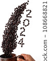 Fresh coffee beans falling into the wooden cup with text from coffee beans 2024 for Happy New Year Concept. Isolated on white background. 108668821