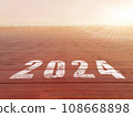 New year 2024. Text of 2024 has written on the ground. 108668898