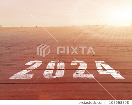 New year 2024. Text of 2024 has written on the ground. New year 2024. Text of 2024 has written on the ground. 108668898