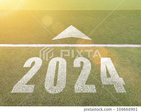 New year 2024. Text of 2024 has written on the ground. Straight forward concept. Keep going to the goal. target and challenge. 108668901