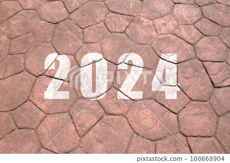 New year 2024. Text of 2024 has written on the ground. New year 2024. Text of 2024 has written on the ground. 108668904