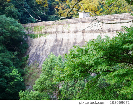 Landscape with spillway dam Landscape with spillway dam 108669671