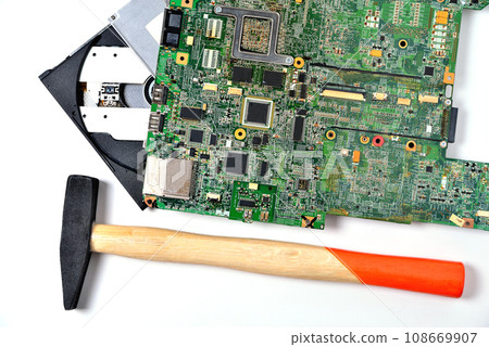 An old micro circuit for a laptop and CD rom , White background An old micro circuit for a laptop and CD rom , White background 108669907